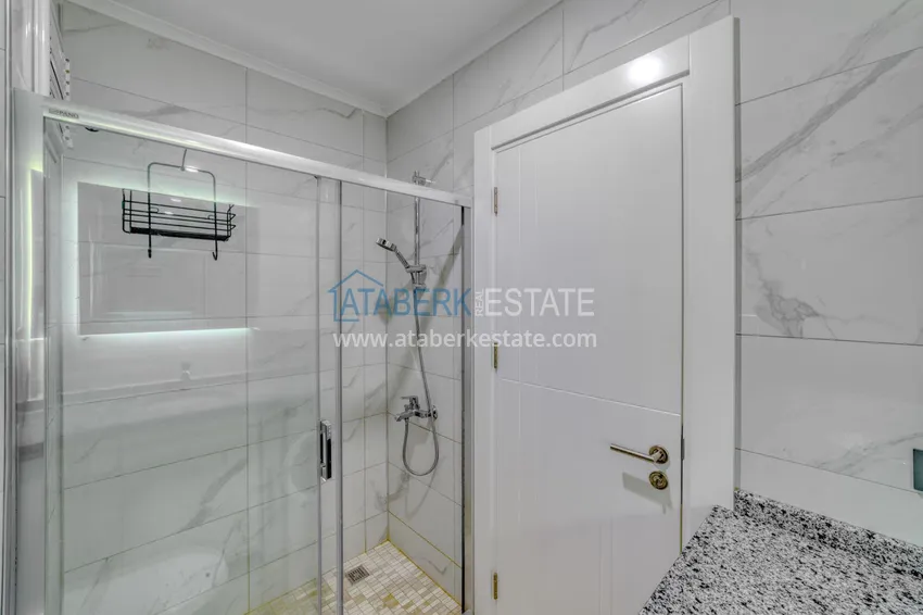 Kupuj Apartament pod klucz z dwiema sypialniami w Mahmutlar w nowoczesnym kompleksie 21