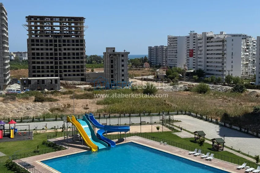 Трехкомнатная квартира с чистовой отделкой в Мерсине, Томюк 2 