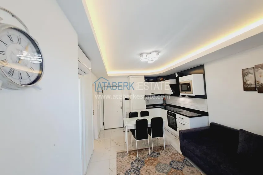 Purchase One bedroom apartment in the center of Alanya with furniture and access to a private beach 2 