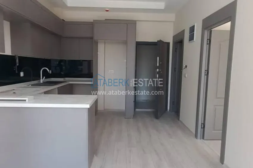 Kupuj Nowy apartament z jedną sypialnią z widokiem na morze w Tomyuk, Mersin 3