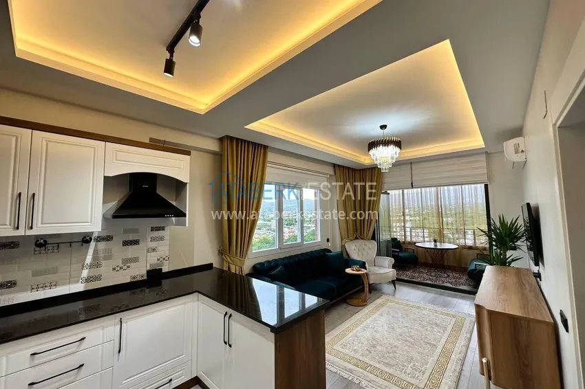Purchase Turnkey two-bedroom apartment with sea view in Mersin - Tomyuk 4 