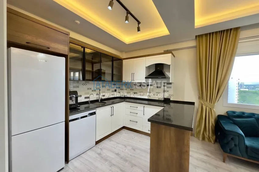 Purchase Turnkey two-bedroom apartment with sea view in Mersin - Tomyuk 5 