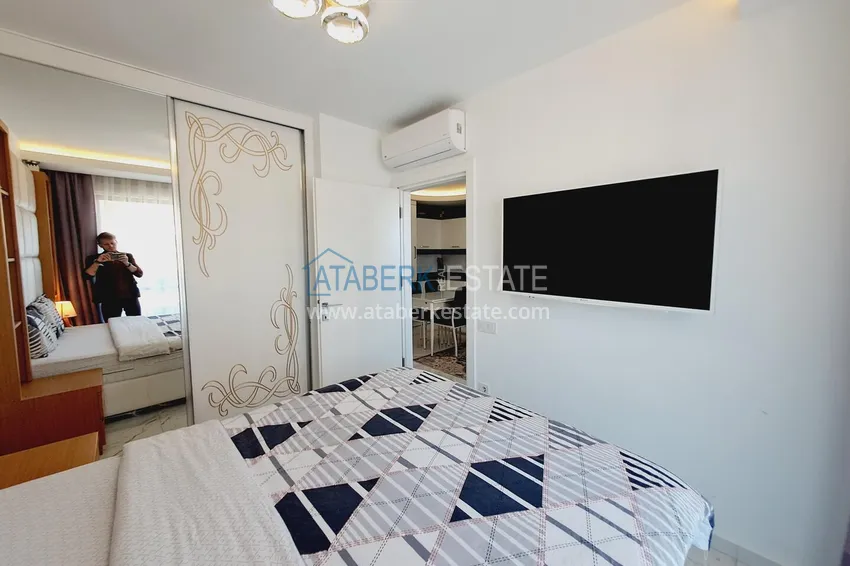 Purchase One bedroom apartment in the center of Alanya with furniture and access to a private beach 6 