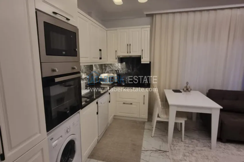 Purchase Furnished three-room apartment in a prestigious area of Alanya, Oba 9 