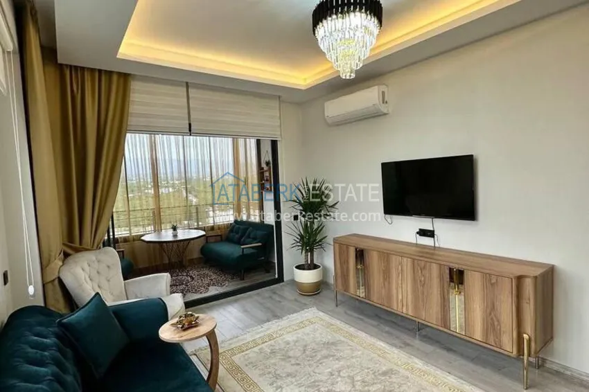 Purchase Turnkey two-bedroom apartment with sea view in Mersin - Tomyuk 10 