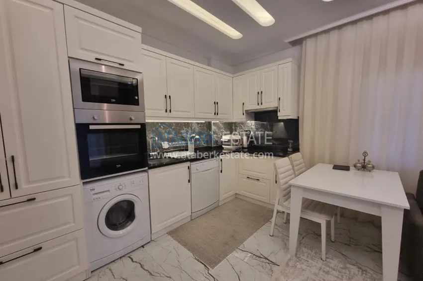 Purchase Furnished three-room apartment in a prestigious area of Alanya, Oba 10 