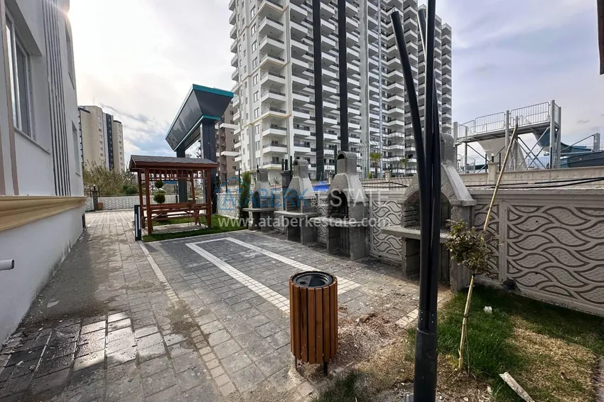 Finished one-bedroom apartments in a new complex with infrastructure — Tomyuk, Mersin 5