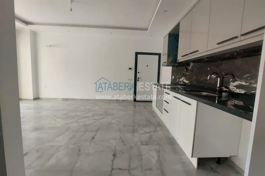 Kupuj Przytulny apartament 1+1 w centrum Mahmutlar, zaledwie 550 metrów od morza 1 