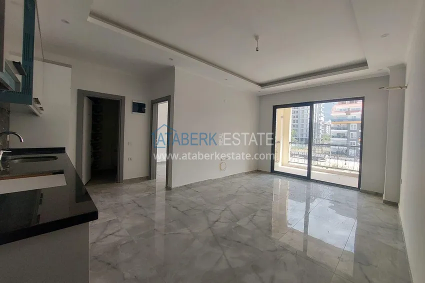 Kupuj Przytulny apartament 1+1 w centrum Mahmutlar, zaledwie 550 metrów od morza 2 