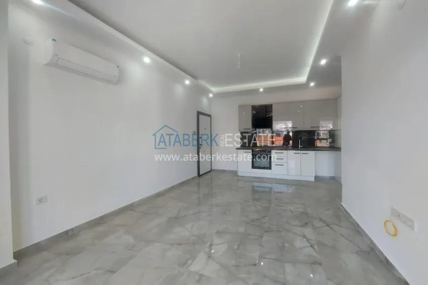 Kupuj Przytulny apartament 1+1 w centrum Mahmutlar, zaledwie 550 metrów od morza 11 