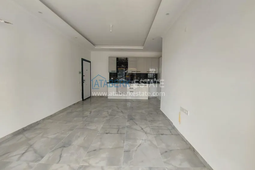 Kupuj Przytulny apartament 1+1 w centrum Mahmutlar, zaledwie 550 metrów od morza 4 