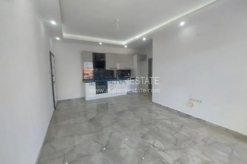 Kupuj Przytulny apartament 1+1 w centrum Mahmutlar, zaledwie 550 metrów od morza 12 
