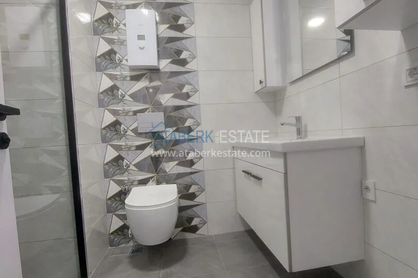 Kupuj Przytulny apartament 1+1 w centrum Mahmutlar, zaledwie 550 metrów od morza 14 