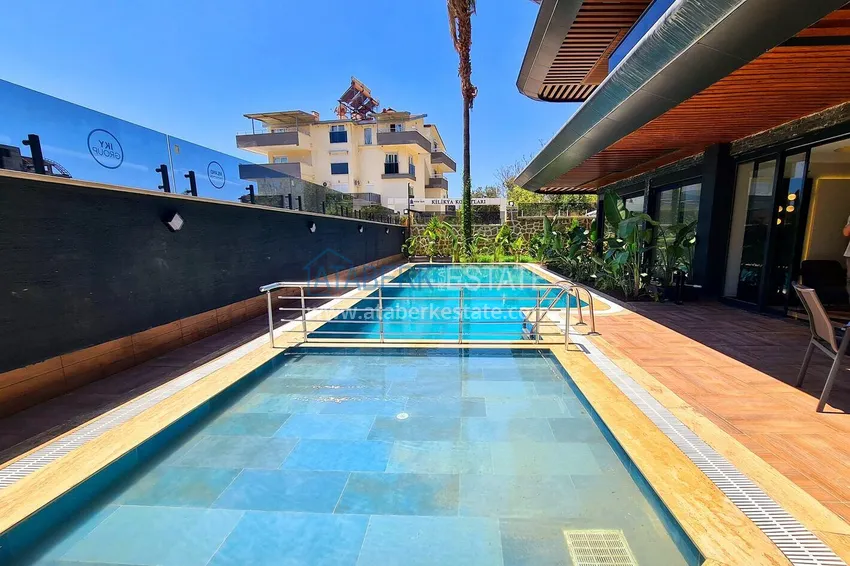Penthouse 1+1 with a fine finish in an elite complex — the center of Alanya, Buyuk Hasbahce district 11 