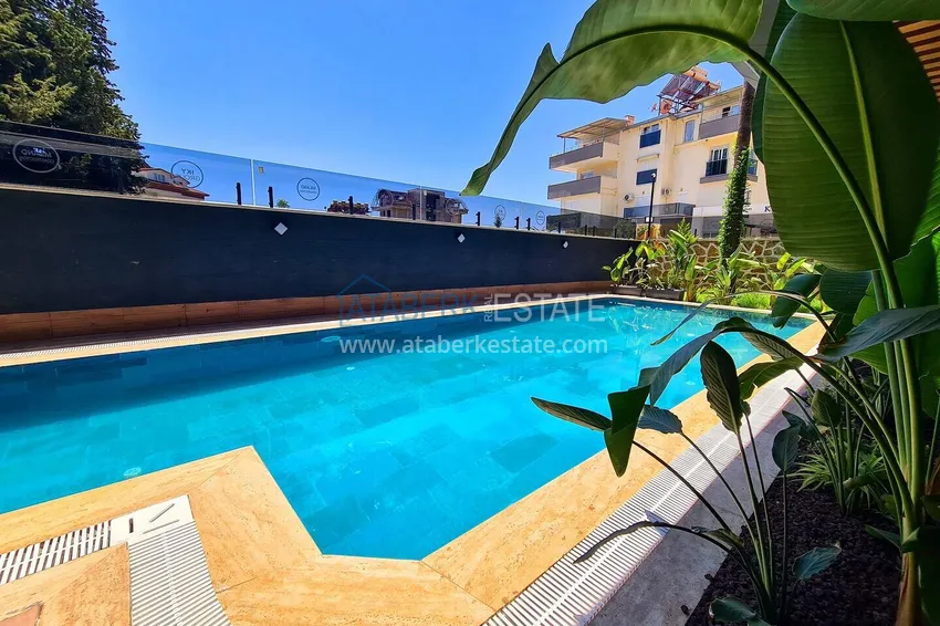 Penthouse 1+1 with a fine finish in an elite complex — the center of Alanya, Buyuk Hasbahce district 12 