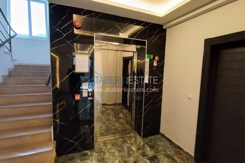 Three-room city apartment with furniture and a separate kitchen in the center of Alanya 11