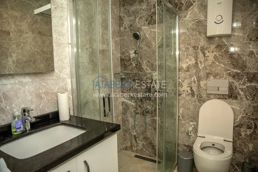 Kupuj Umeblowany apartament 2+1 w komfortowym kompleksie - centrum Alanyi, plaża Kleopatra 12