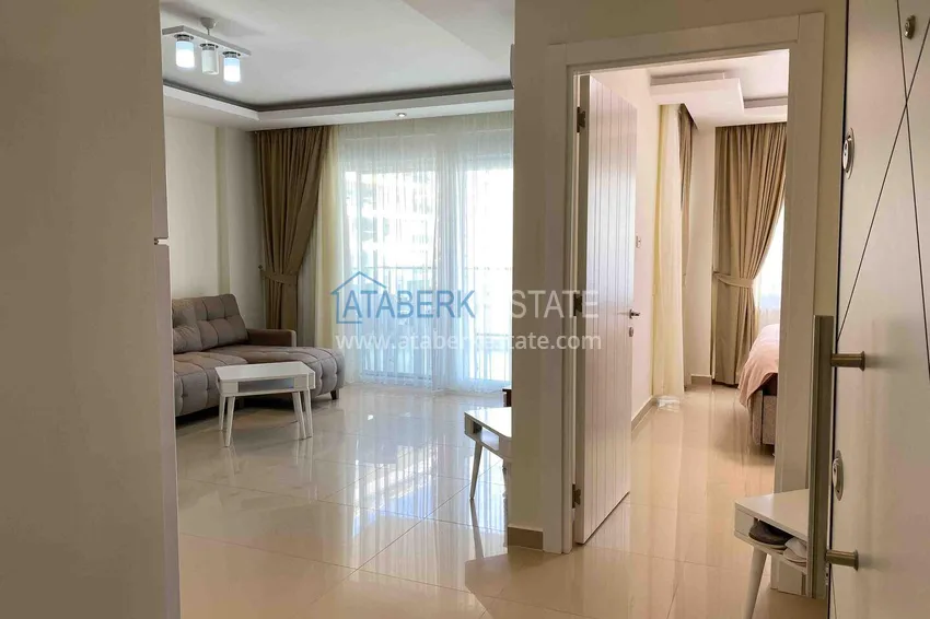 Kupuj Apartament pod klucz 1+1 z przeszklonym balkonem w kompleksie z prywatną plażą — Avsallar, Alanya 1