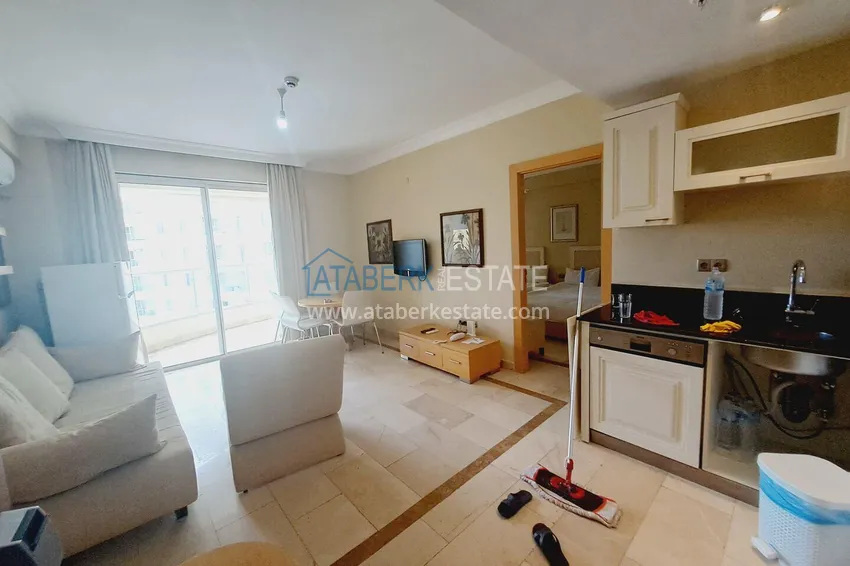 Kupuj Umeblowany apartament z widokiem na góry w legendarnym kompleksie hotelowym - dzielnica Mahmutlar, Alanya 1 