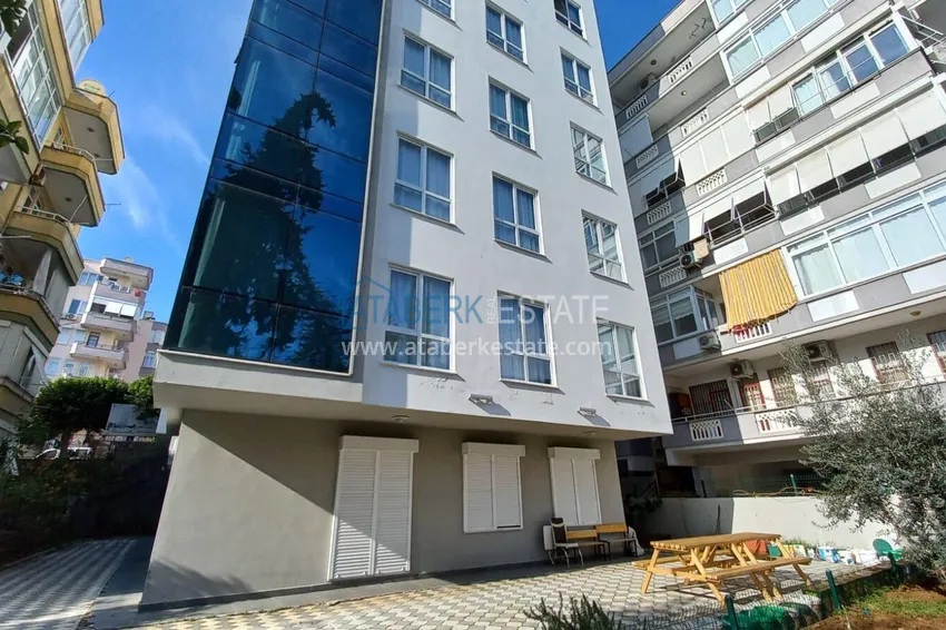 Three-room city apartment with furniture and a separate kitchen in the center of Alanya 5