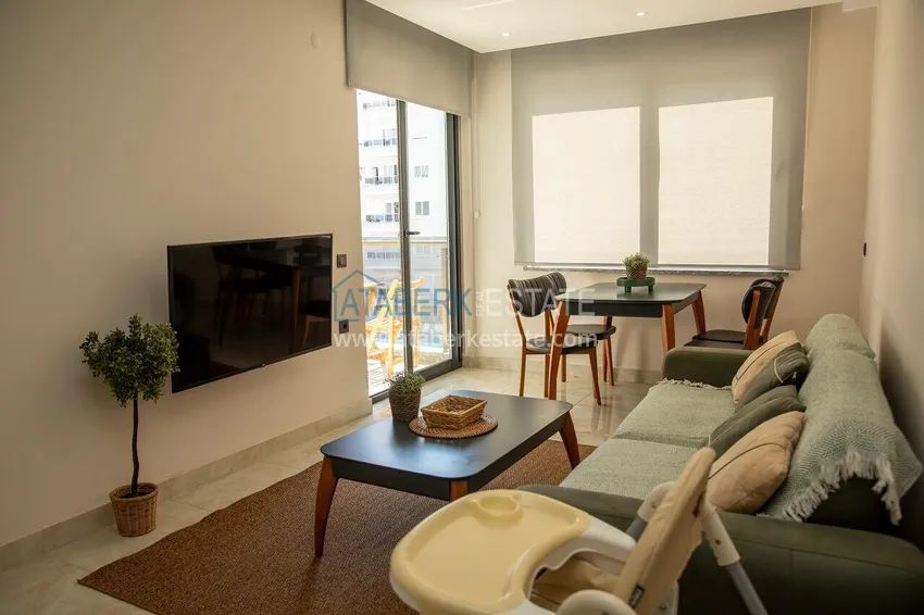 Kupuj Umeblowany apartament 2+1 w komfortowym kompleksie - centrum Alanyi, plaża Kleopatra 6