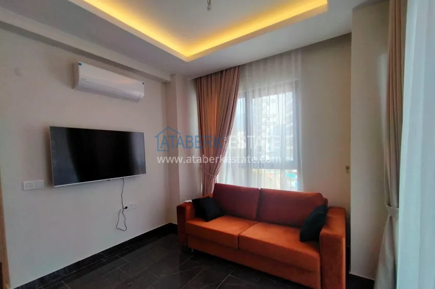 Kupuj Jednopokojowy apartament z meblami w nowoczesnym kompleksie — Alanya, dzielnica Mahmutlar 9