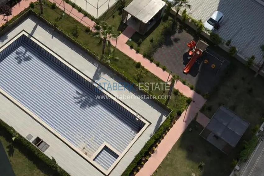 Purchase 1+1 apartment with sea view and quality finishes - Mersin, Tezje district 12
