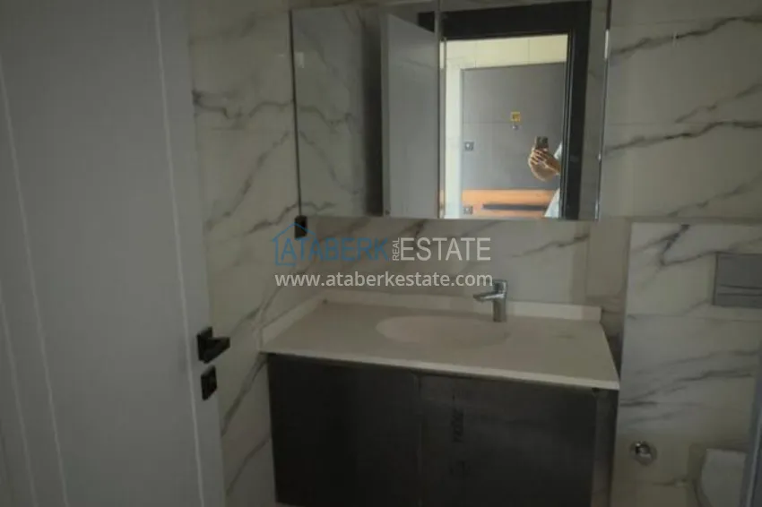 Purchase 1+1 apartment with sea view and quality finishes - Mersin, Tezje district 7