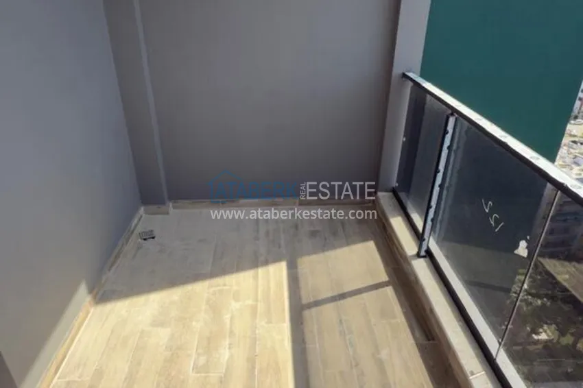 Purchase 1+1 apartment with sea view and quality finishes - Mersin, Tezje district 9