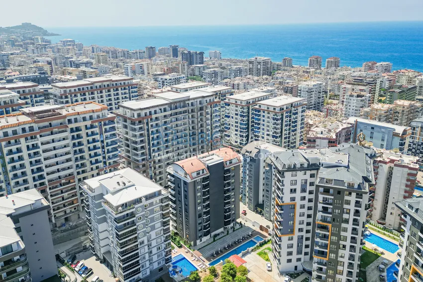 Cozy apartment 1+1 with furniture, glazed balcony and mountain view - Mahmutlar, Alanya 1