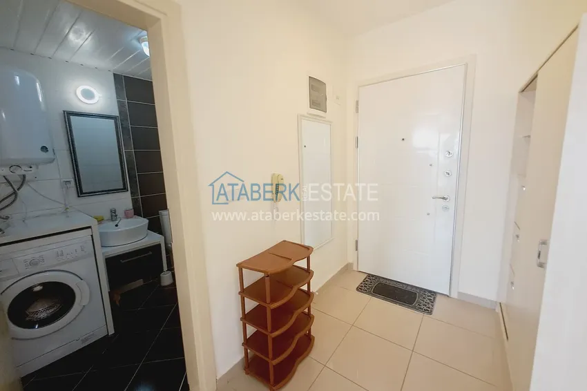 Kupuj Apartament 1+1 z meblami, widokiem na morze i przeszklonym balkonem - Alanya, dzielnica Mahmutlar 1