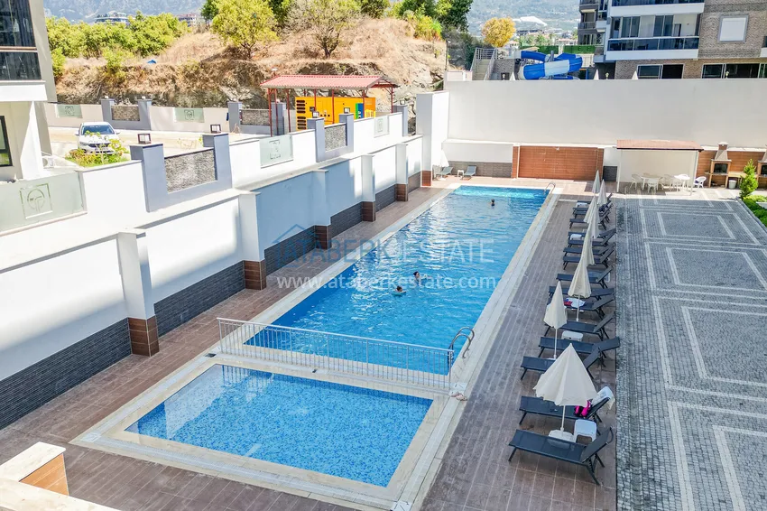 Cozy apartment 1+1 with furniture, glazed balcony and mountain view - Mahmutlar, Alanya 6
