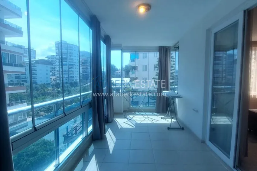 Kupuj Apartament 2+1 z meblami i dwoma przeszklonymi balkonami 450 metrów od morza - Mahmutlar 14