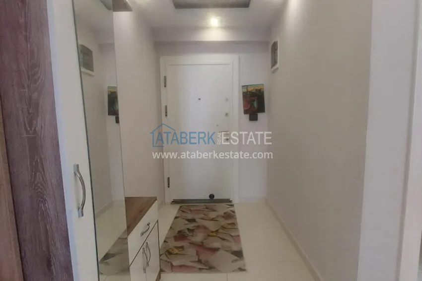 Kupuj Apartament 2+1 z meblami i dwoma przeszklonymi balkonami 450 metrów od morza - Mahmutlar 1