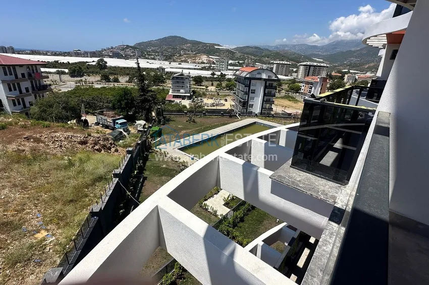 Purchase 1+1 apartment with sea view in a new complex - Alanya, Demirtash district 12