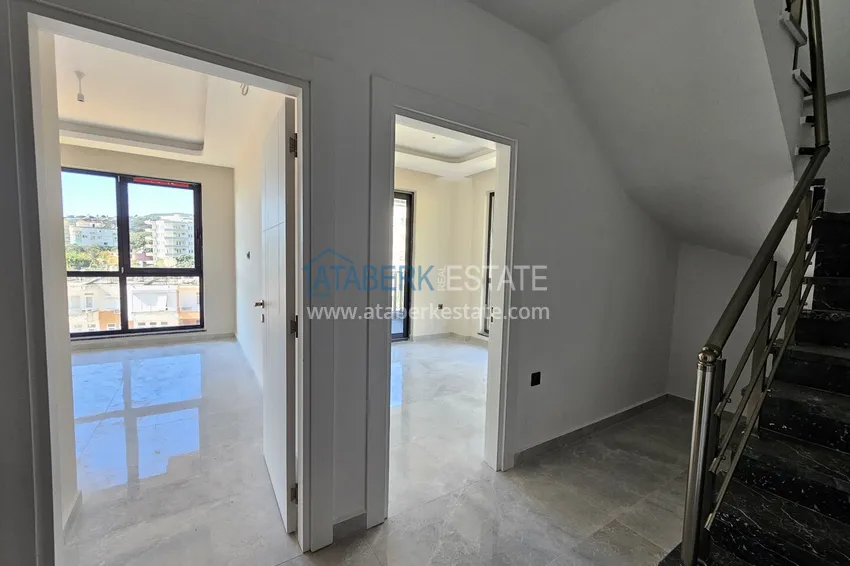 Kupuj Panoramiczny dwupoziomowy penthouse w kompleksie butikowym - centrum Alanyi, plaża Kleopatra 3 