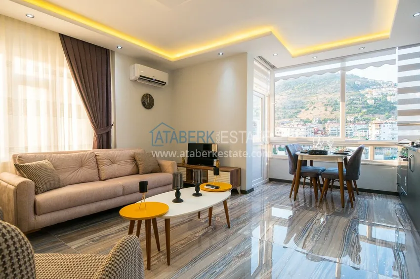 Purchase Ready-made housing in the center of Alanya, for a residence permit — a one-bedroom apartment with furniture and mountain views 4