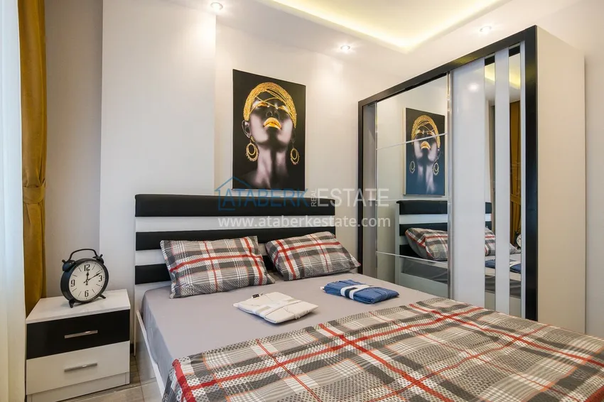 Purchase Ready-made housing in the center of Alanya, for a residence permit — a one-bedroom apartment with furniture and mountain views 11