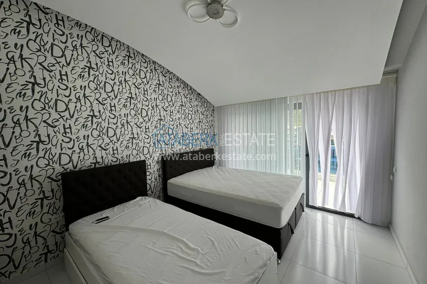 Purchase 2+1 penthouse with new furniture and panoramic views in Alanya, Kargicak district 11