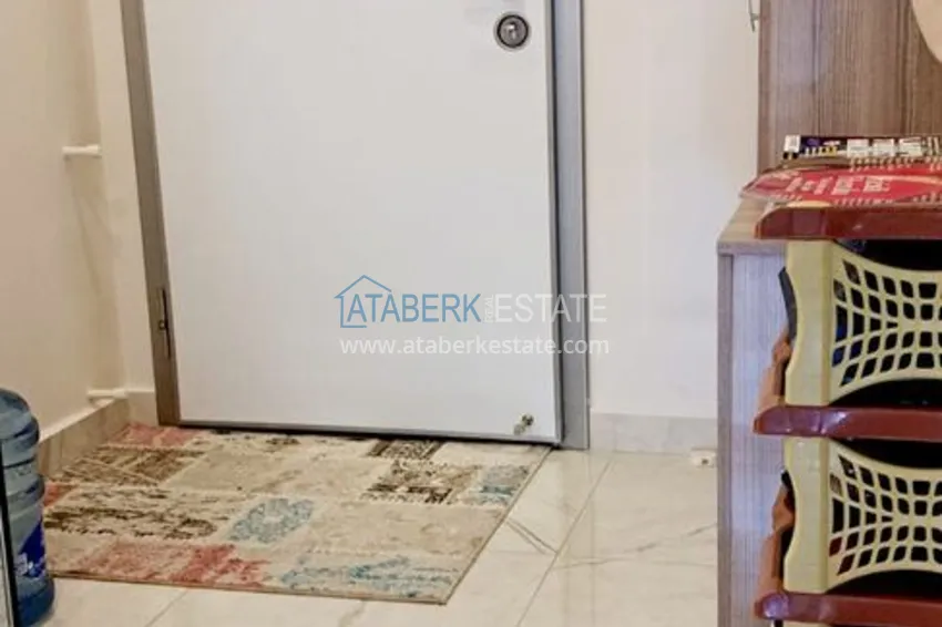 Kupuj Apartament 2+1 z oddzielną kuchnią i przeszklonym balkonem w centrum Alanyi — meble odpowiednie na zezwolenie na pobyt 1