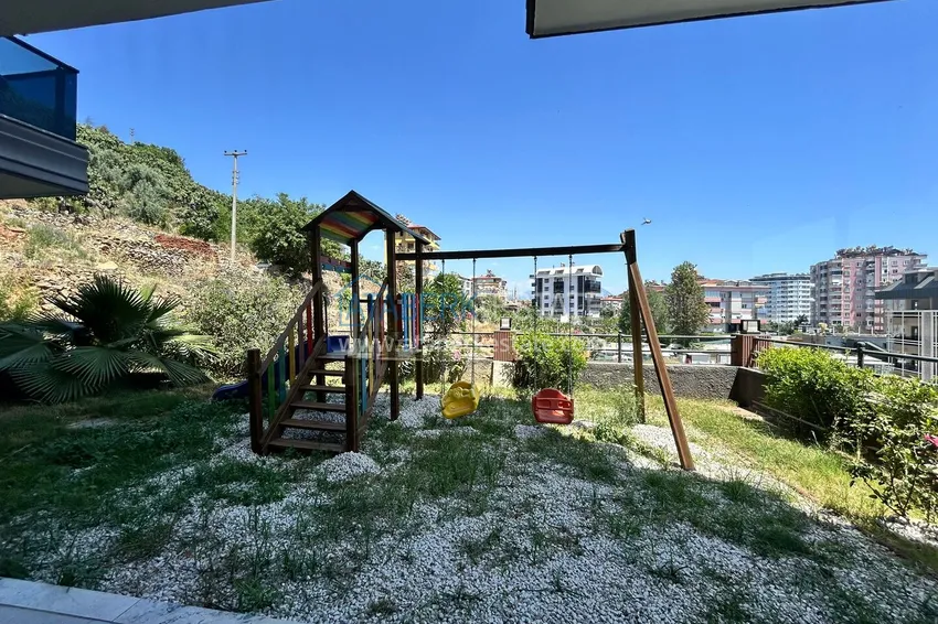 Dwupoziomowy penthouse 2+1 z widokiem na morze i góry w centrum Alanyi 11 