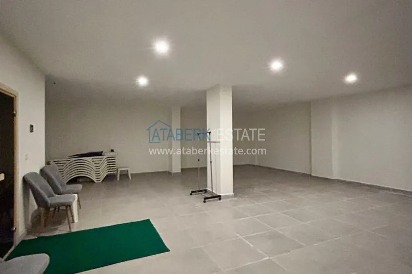 Dwupoziomowy penthouse 2+1 z widokiem na morze i góry w centrum Alanyi 18 