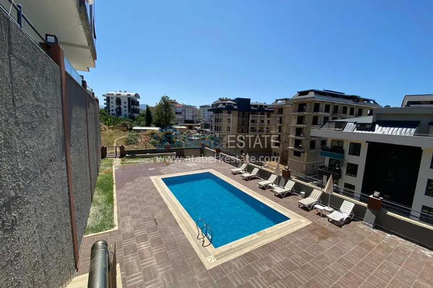 Dwupoziomowy penthouse 2+1 z widokiem na morze i góry w centrum Alanyi 6 