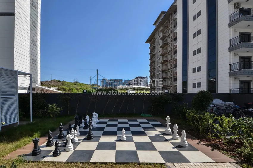 2+1 apartment with furniture, glazed balcony and sea view in the center of Mahmutlar, Alanya 9 