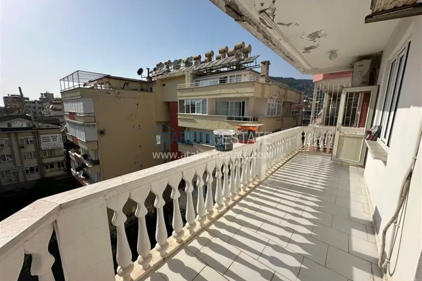 Purchase 2+1 apartment with a residence permit in the center of Alanya — furniture, view of the fortress 12 
