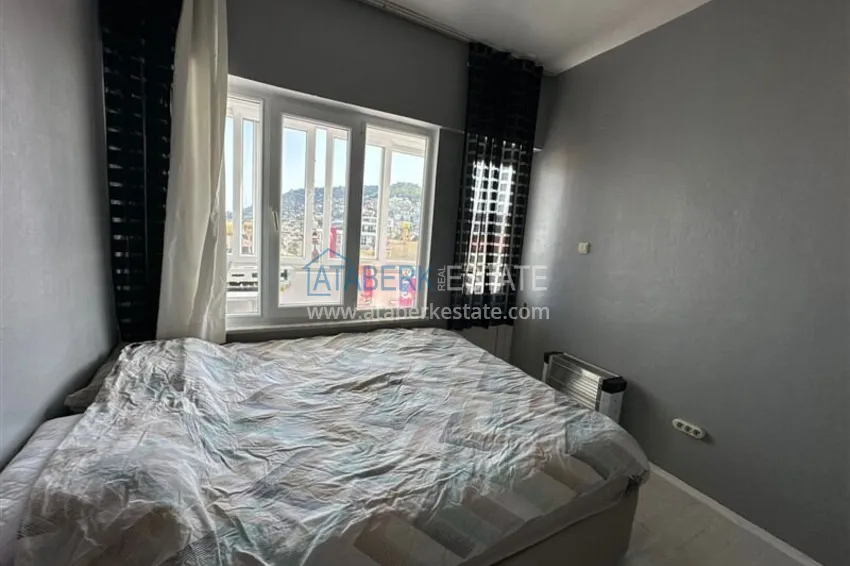Purchase 2+1 apartment with a residence permit in the center of Alanya — furniture, view of the fortress 19 