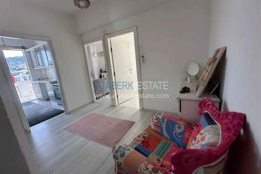 Purchase 2+1 apartment with a residence permit in the center of Alanya — furniture, view of the fortress 23 