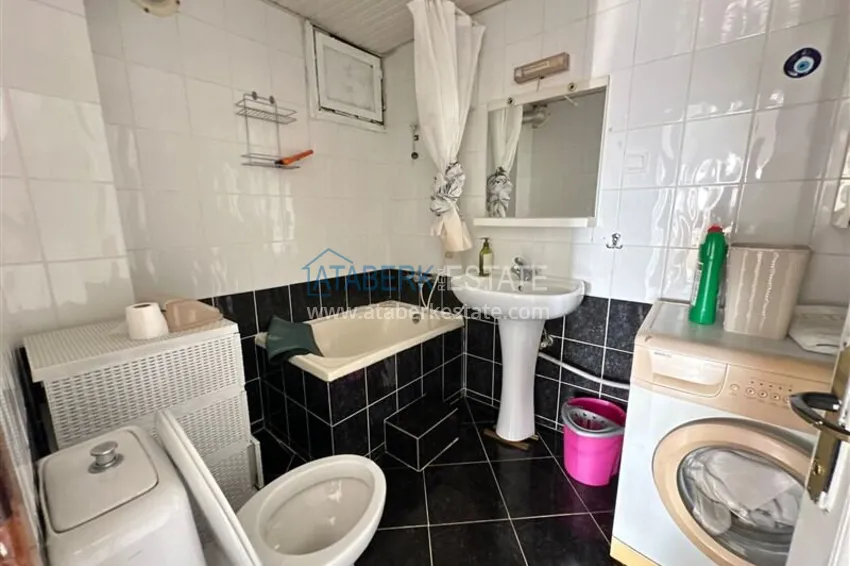 Purchase 2+1 apartment with a residence permit in the center of Alanya — furniture, view of the fortress 25 