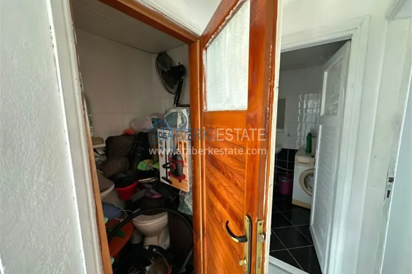 Purchase 2+1 apartment with a residence permit in the center of Alanya — furniture, view of the fortress 26 