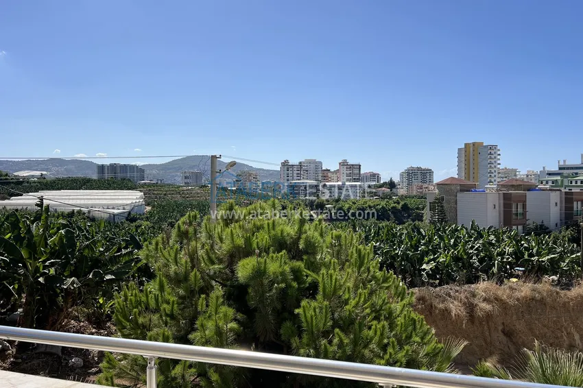Purchase 2+1 apartment with furniture and mountain views in Mahmutlar at an attractive price 13 
